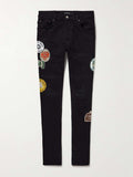 AMIRI Skinny-Fit Appliquéd Black Distressed Jeans