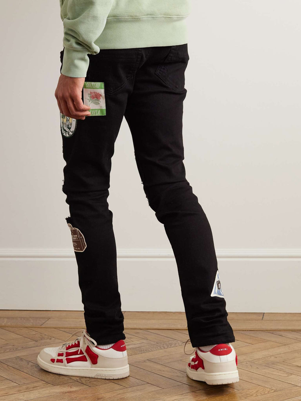 AMIRI Skinny-Fit Appliquéd Black Distressed Jeans